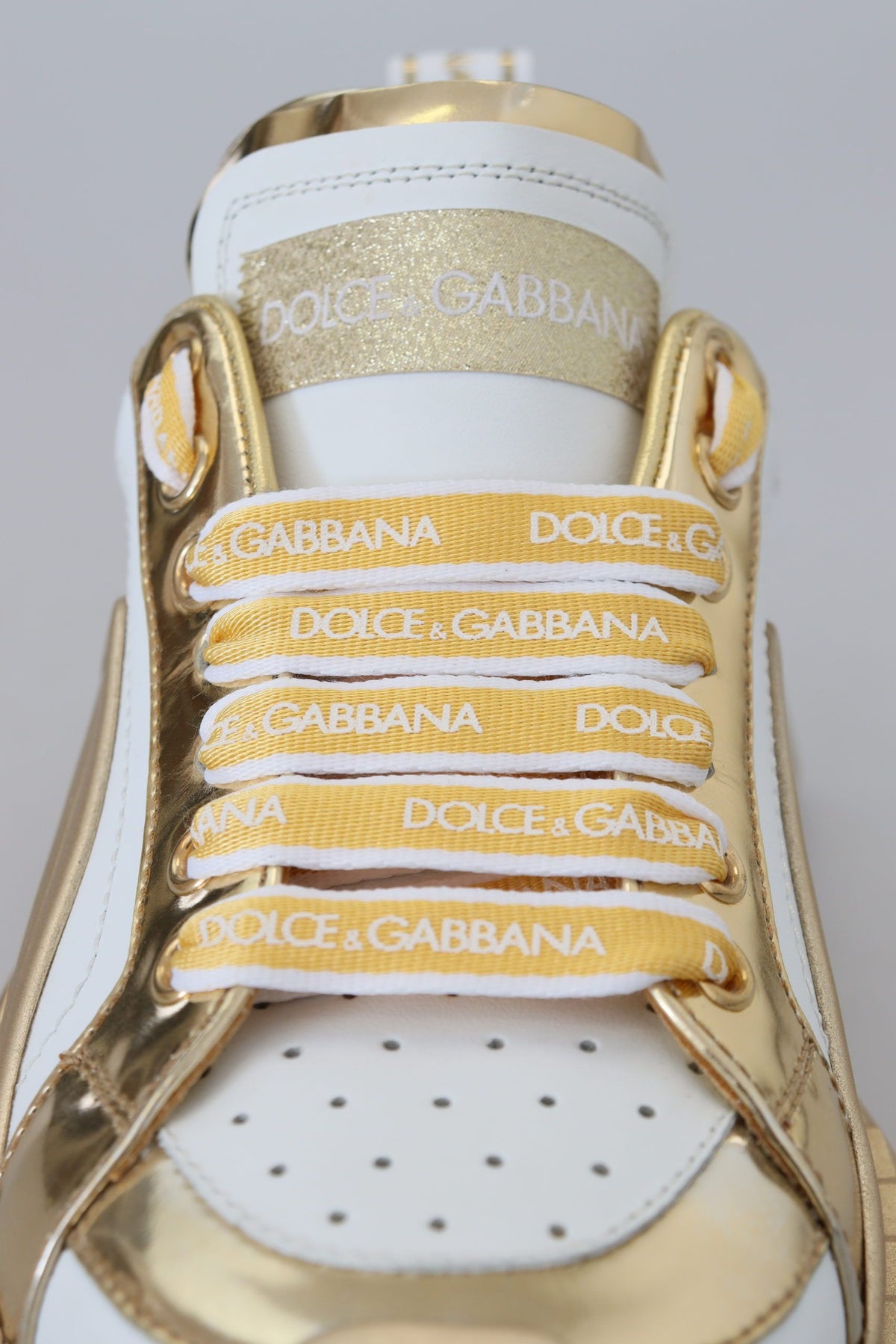 Dolce & Gabbana Elegant White and Gold Leather Sneakers