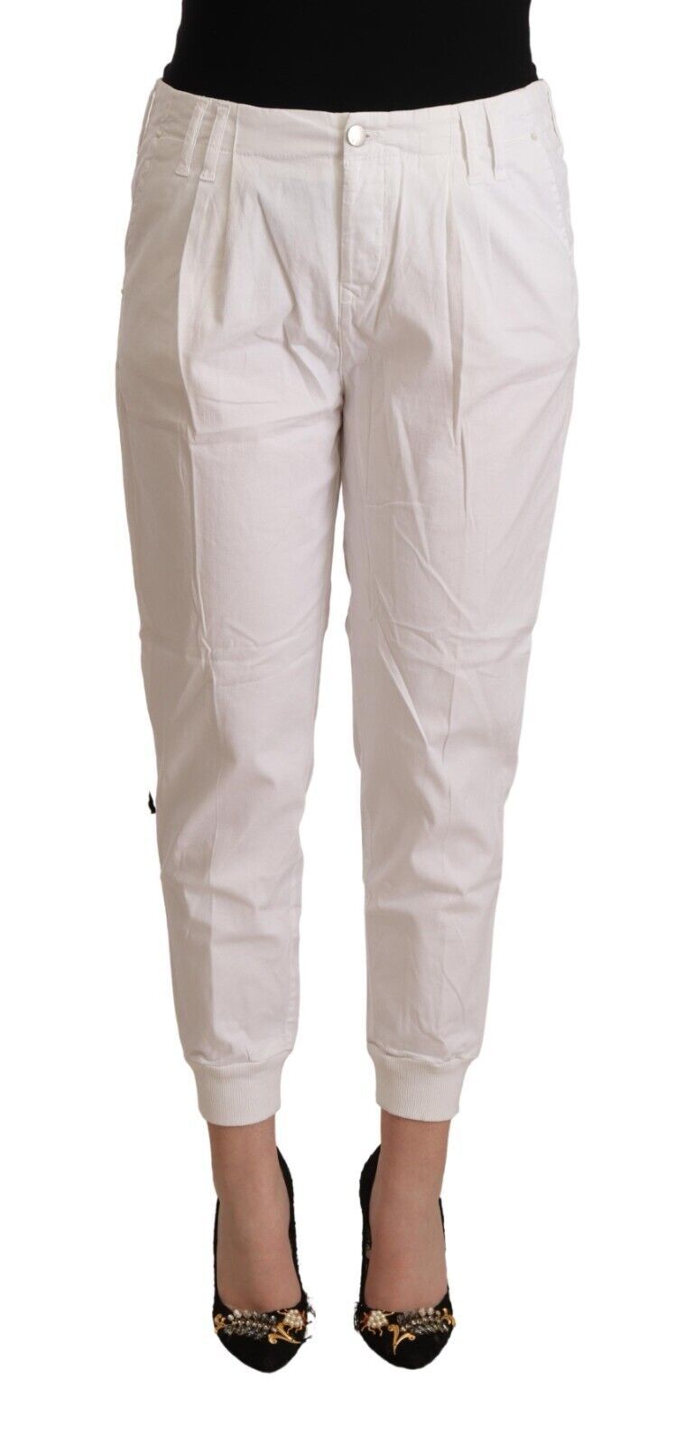 With chic white tapered cropped pants